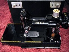 Singer's Featherweight 222K model. It was from the year 1954.
